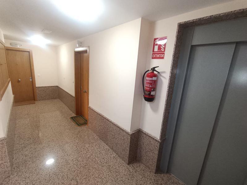 Pasillo y ascensor